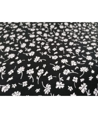 Viscosa 100% fondo negro flores blancas 1.50 m ancho